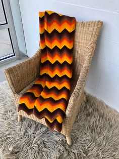 a chair with a blanket on top of it