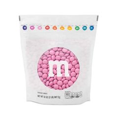 m & m's pink chocolate candies in a bag on a white background