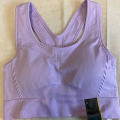 Brand New Never Worn. Color Is A Light Purple. Made Of Nylon And Spandex. Perfect For Teens And Tweens Too. Pfsf Home. All Sales Photographed. Gb1 Fitted Nylon Seamless Sports Bra, Purple Compression Seamless Activewear, Purple Seamless Sleeveless Activewear, Purple Sleeveless Seamless Activewear, Purple Nylon Yoga Activewear, Purple Seamless Sports Bra For Gym, Purple Nylon Activewear For Gym, Purple Nylon Activewear For Workout, Purple Seamless Sports Bra