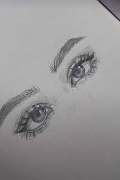 a drawing of an eye with long lashes