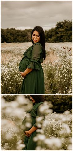 a pregnant woman in a green dress standing in the middle of a field with white flowers