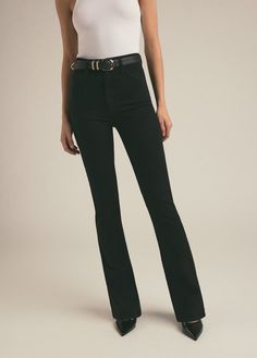 A high five for the super high rise 11.5" bootcut jeans. The retro-inspired style of the black Kyoto wash gives the Valentina a sophisticated look and the stretch gives this denim a well-fitted silhouette. (Gentle fading from a tumbled rinse plus Favorite Daughter embroidery on the back waistband, of course.) 98% Cotton, 2% Elastane Machine Wash Cold Rise / Waist: extreme high rise / pinched Hips: fitted at hips Leg: slim mini boot Average Height: full length 11.5" rise 14.25" knee16.5" leg open Fitted Flare Jeans With Belt Loops For Fall, Classic High-rise Flare Jeans For Fall, Classic High Rise Flare Jeans For Fall, Classic Fitted Flare Jeans With Belt Loops, Fitted Classic Flare Jeans With Belt Loops, Classic High Rise Flare Jeans With Belt Loops, Modern Black Denim Flare Jeans, Chic Black Straight Leg Flare Jeans, Black High Rise Fitted Flare Jeans