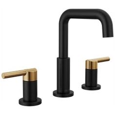 two black and gold faucets with handles on each side, one in the middle