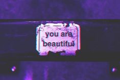 a sign that says you are beautiful on it