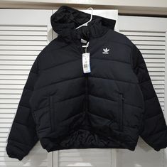 Adidas Originals Puffer Black Jacket Adidas Winter Outerwear For Cold Weather, Adidas Outerwear For Cold Weather, Adidas Long Sleeve Winter Outerwear, Adidas Hooded Fall Outerwear, Adidas Hooded Outerwear For Fall, Adidas Fitted Hooded Outerwear, Adidas Fitted Outerwear For Fall, Casual Black Adidas Outerwear, Black Puffer Jacket Outfit