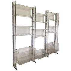 two clear shelvings with shelves on each side