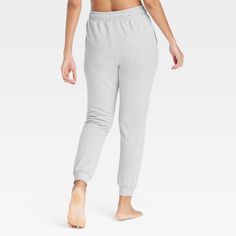 Stay effortlessly cozy as you lounge around the house wearing these Fleece Jogger Pants from Auden™. Made from ultra-soft, brushed fleece fabric for a relaxed, easy fit that's perfect for lounging, these joggers are designed with a regular rise and tapered legs. The front drawstring tie provides a customizable fit, while side pockets give you space for stashing small essentials. Auden™: Comfort true to every shape & hue. Target Clothes, Beach Pants, Fleece Joggers, Womens Fleece, Bottom Clothes, Pull On Pants, Straight Pants, Chinos Pants, Fleece Fabric