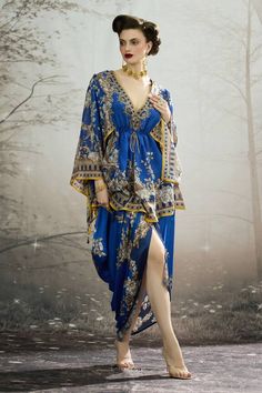 Blue silk peplum tunic with all over regal floral prints. - Aza Fashions Silk Floral Print Party Kaftan, Elegant Floral Print Tunic Kaftan, Bohemian Floral Print Evening Kaftan, Silk Printed Dress For Eid, Elegant V-neck Dress With Digital Print, Blue Silk Dress With Digital Print, Blue Bohemian Dress With Traditional Drape, Elegant Blue Floral Print Kaftan, Festive Blue Dress With Kimono Sleeves