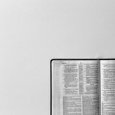 an open book sitting on top of a table