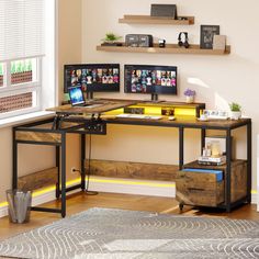 a computer desk with two monitors on top of it