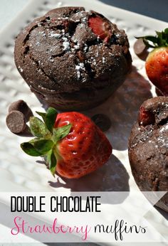 chocolate strawberry muffins on a plate with strawberries