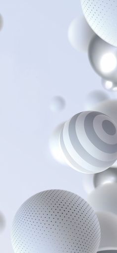 an array of white objects floating in the air with circles and dots around them on a light gray background