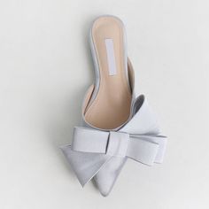 Dianna Silk Satin Pointed Big Bow Tie Slippers - 5 Colors. Lovely silk satin slide slipper with fashionably big bow ribbons in vivid solid colors. Wherever you go you will not go unnoticed. Being flat height, these slippers are versatile in styling - casually with jeans or dress it up for special events like wedding! Gender: WomenItem Type: Slippers, ShoesUpper Material: SilkOutsole Material: RubberLining and Insole Material: Poly UrethaneHeel Height: Low, 1.5 cm / 1.6 inchFit: Fits true to size Shoes Korean, Silk Bow Ties, Fur Shoes, Comfortable Slippers, Winter Ankle Boots, Summer Slippers, Slides Women, Heel Slippers, Slippers Cozy