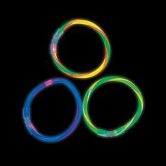 three neon colored rings on a black background