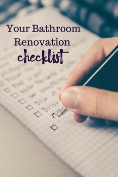 someone is writing in a notebook with the text your bathroom renovation checklist on it