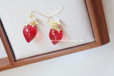 Strawberry Drop earrings. These beautiful epoxy earrings are 100% handmade. Each pair of earrings and necklaces take couple days to finish. I hope you can enjoy it. It is a perfect gift for her, friend, Wedding, Anniversary, Valentine's Day and Mother's Day, etc. Package time: 1-2 business days Deliver time：I located Southern California. If you are in the United States, the package usually take 3-5 business days to receive it. Shipping: USPS and UPS depending on the location. Wrapping package: I will wrap the earrings and necklace before I ship them out. I will put them in a small jewel box with ribbon (please note packaging may vary) if you want me leave a greeting note, I am glad to help. I will leave the note in a greeting card. Please let me know. Material: 925 silver, Gold-plated tita Strawberry Drop, Epoxy Earrings, Strawberry Earrings, Earrings Cute, Jewel Box, Earrings Drop, Perfect Gift For Her, Friend Wedding, Cute Jewelry