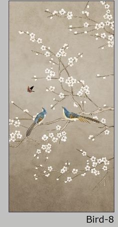 two birds sitting on a branch with white flowers