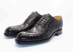 Style: 5817-1233A-Black Exclusively for C & E, this Completely Handmade, Hand Burnished Genuine Alligator lace-up oxford from the Ugo Vasare collection features Goodyear Welted construction, soft Calfskin lining, a Cap Toe, Decorative Perforations with Pinking Detail, a stitched welt and a full Leather sole! Please note: Some sizes are on Back Order. Cordovan Shoes, Shoe Horn, Black 13, Shoe Tree, A Cap, Goodyear Welt, Horse Hair, Black 7, Suede Shoes