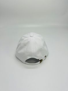 Top off your everyday style with our Urban Elite Cap, the perfect accessory for any casual or sporty look. This cap combines modern style with classic comfort, featuring a sleek design and a premium embroidered emblem that adds a touch of sophistication. Constructed with high-quality materials, it provides both durability and a comfortable fit, thanks to its adjustable strap. Whether you’re hitting the streets or the stadium, the Urban Elite Cap is your go-to choice for a sharp, finished look th Belt Ring, Casual Beach Wear, Cap White, Sporty Look, New Arrival Dress, The Urban, Shop Swimwear, Monday Friday, Everyday Style