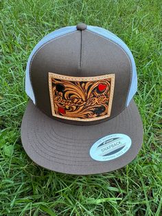 Western Tooled Leather Patch Cap with a unique and beautiful design. Yupoong snapback caps with hand tooled leather patch sewed on. Caps are adjustable to fit any desired size. Meant to complete any western fit!! Snapback Caps, Hand Tooled Leather, Black Camo, Tooled Leather, Leather Patches, Snapback Cap, Leather Tooling, Trucker Cap, Poker