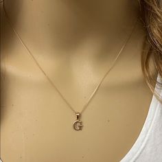 10k Rose Gold Initial Letter G Pendant Necklace Mini Small Metal Type: 10k Solid Yellow Gold (Also Available In 14k Solid Gold) Metal Color: Yellow Gold. (Also Available In White Gold And Rose Gold) Measurement: Height Including Bail: 0.60 In (15.79 Mm) Width: 0.18 In (4.80 Mm) - 0.45 In (11.32 Mm) Pendant Only Weight: 0.6 Grams Pendant W/Chain Weight: 1.6 - 1.8 Grams (Vary From Chain) Chain Available In 16", 18", 20", 22" Brand New. Available In Any Letter A-Z Made To Order. Please Allow 5-7 Da Initial Necklace G, Classic Rose Gold Initial Necklace For Formal Occasions, Classic Rose Gold Initial Necklace, Yellow Gold Initial Necklace, G Initial Necklace, G Necklace, Rose Gold Initial, Shine Jewelry, Cross Necklace Sideways