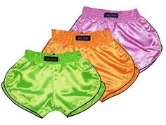 three pairs of shorts with different colors on them