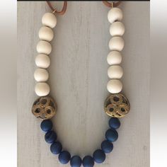 Blue Druzy Agate, Cream Wood And Brass Necklace. One Of My Favorite Pieces. Another One For Any Season. The Druzy Beads Are A Beautiful Shade Of Blue. 8-10mm Bead Size 12-30" Adjustable Length Blue Wooden Beads Round Jewelry, Blue Wooden Round Beads Jewelry, Blue Wooden Beaded Round Jewelry, Elegant Blue Jewelry With Wooden Beads, Blue Beaded Everyday Necklace, Blue Wooden Beads Jewelry For Jewelry Making, Adjustable Blue Necklace With Wooden Beads, Everyday Blue Bohemian Beaded Necklace, Everyday Bohemian Blue Beaded Necklace