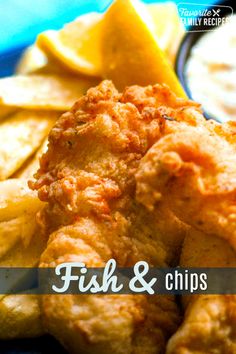 fish and chips on a plate with dip