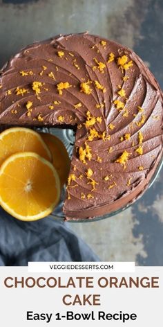 chocolate orange cake on a plate with an orange slice