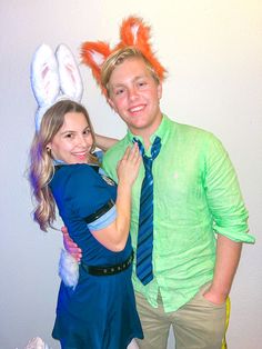 a man and woman dressed up in bunny ears