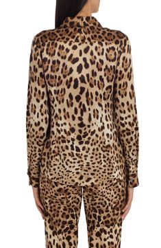 Dolce&Gabbana’s iconic leopard print makes a fierce statement on a fluid satin blouse sewn from stretch-hinted Italian silk. 29 1/2" length (size 40 IT) Hidden-button placket Peter Pan collar Long sleeves with button cuffs 93% silk, 7% spandex Dry clean Made in Italy Women's Designer Clothing Fitted Leopard Print Blouse For Work, Blouse Nordstrom, Satin Blouse, Pan Collar, Peter Pan Collar, Designer Outfits Woman, Button Placket, Peter Pan, Light Brown