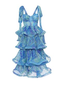 Blue pleated dress with metallic effect, bustier with cups and long straps that can be tied. Veils that finish with a lifting band and a zip fastening at the back. Blue Dress With Adjustable Straps And Fitted Bodice, Tiered Corset Dress With Ruffles For Party, Tiered Ruffle Corset Dress For Party, Blue Corset Dress With Spaghetti Straps For Party, Party Dress With Pleated Bodice And Ruffled Straps, Evening Corset Dress With Fitted Bodice And Ruffled Straps, Ruched Gala Dress With Ruffled Straps, Cocktail Corset Dress With Spaghetti Straps And Ruffles, Summer Party Corset Dress With Tie Straps