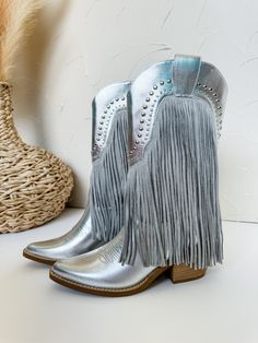 Step out in style with our Adela Studded Fringe Boots in Silver! These boots are perfect for any western-inspired look, with their beautiful fringe details and sleek silver color. Stand out from the crowd and make a statement with these trendy and unique boots. Add them to your wardrobe and elevate your fashion game today! Unique Boots, Fringe Boots, Silver Gifts, Fashion Games, Silver Color, Quality Fabric, Multi Color, Shoe Boots, Boots