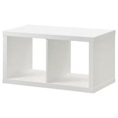 a white shelf with two open compartments