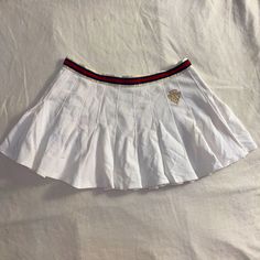 Incredibly Cute And Rare Gucci Tennis Skirt With A Simple Cute Logo And Blue And Red Stripe Around The Top Of The Skirt It's So Cute And Perfect For Any Outfit ~ Waist 28" (No Stretch) Length 11" Bought For $300 So Just Trying To Make My Money Back #Gyaru #Coquette Nymphet Lana Del Rey Horror Game Protatagonist Gal Kei Larme Lizlisa Blue Label Femme Fatale Fairycore Fairy #Y2k #Kawaii Jfashion Brandy American Apparel Angelcore Angel #Princess Gucci Skirt, Y2k Kawaii, Angel Princess, Cute Logo, White Tennis Skirt, Fairy Y2k, Fairycore Fairy, Blue Label, Red Stripe