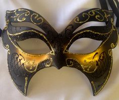 This fancy butterfly style masquerade mask is new available in variety of colours. These masquerade masks have a ribbon tie concept to create a comfortable fit and great to reuse if needed. Masquerade mask Measurements:  7.5" inches across 4.5" inches high This beautiful masquerade mask is great for a birthday party, wedding or Halloween costume party. We do our best to take live, clear and as many pictures as possible to guarantee what you see is what you will receive. Any issues with the purch Adjustable Masquerade Mask For Mardi Gras, Adjustable Masquerade Mask For Carnival Party, Adjustable Masquerade Mask For Carnival Costume Party, Adjustable Masquerade Mask For Costume Party, Adjustable Mardi Gras Party Mask, Halloween Eye Mask As A Gift, Halloween Eye Mask Gift, Adjustable Masks And Prosthetics For Carnival Party, Black Costume Accessories For Carnival Gift