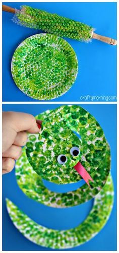 the paper plate snake is made to look like it has its tongue out and eyes open