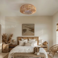 a bed sitting in a bedroom next to a table and chair on top of a hard wood floor