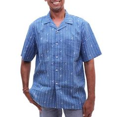 Decorating this men's linen and cotton blend shirt village huts and palm trees in white contrast with a Prussian blue body. Javanese artisan Rudi Wijoyo creates this casual shirt which is decorated using the traditional batik method; a wax resist is printed onto the fabric before it is submerged in dye. This shirt features short sleeves a collared neckline and a button-up front. Indigo Plant, Batik Art, Wax Resist, Prussian Blue, Mens Linen, Married Men, My Wife Is, Contemporary Fashion, Casual Shirt