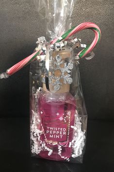 a clear bag filled with candy canes and an iced peppermint flavor in it