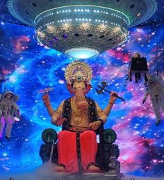 an image of the statue of lord ganesha in front of a colorful background