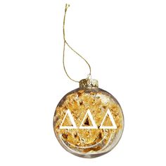 a glass ornament with three triangles on it