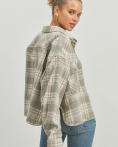 A fall wardrobe classic. Crafted from soft, brushed fabric, this cropped flannel shirt is a timeless go-to for all your autumn plans. Made for layering with it's relaxed fit and cozy midweight fabric. Toss it over a tee for those just-chilly enough afternoons, or wear it under your favorite jacket when the temps drop. Model is 5'8" wearing a size small Oversized Flannel Tops For Fall, Fall Cropped Shirt With Pockets, Casual Cropped Shirt With Pockets For Fall, Fall Flannel Tops With Pockets, Long Sleeve Flannel Top For Fall, Collared Flannel Tops For Fall, Fall Cropped Collared Shirt With Relaxed Fit, Fall Cropped Button-up Shirt With Relaxed Fit, Trendy Relaxed Fit Cropped Shirt For Fall