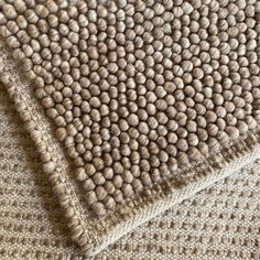 the textured fabric is beige and brown