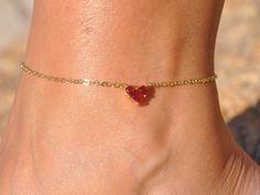 "Red Heart Anklet ♡ PRODUCT DETAILS: - Gold plated cubic zirconia heart, measures approx. 1/2\" (12mm) - Tarnish resistant gold plated (over stainless steel) chain - Personalize it with a hand stamped custom initial disc - Packed in a drawstring bag that is ready to give. - Lobster claw clasp SIZING: Please wrap a string around your ankle to find out the right size for you (length includes the chain, jump rings, and the closure). Apply the length you have got with a string over a tape measure. C Heart-shaped Anklets For Valentine's Day, Adjustable Heart-shaped Anklets For Valentine's Day, Elegant Red Anklets For Gift, Elegant Heart-shaped Anklets For Valentine's Day, Adjustable Anklets For Valentine's Day Gift, Dainty Heart-shaped Anklet For Gift, Dainty Heart-shaped Anklet As Gift, Heart Ankle Bracelet, Wedding Anklets