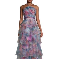 New With Tag. Imprinted. A Vibrant Impressionistic Floral Print Covers This Halterneck Gown Featuring Soft Tiers At The Skirt. Halterneck With Ties. Sleeveless. Zip Back Closure. Back Waist Tie. Draped. Tiered. Lined. Polyester. Dry Clean. Imported. Size & Fit About 60" From Shoulder To Hem Model Shown Is 5'10" (177cm) Wearing Us Size 4 Elegant Multicolor Gown For Evening, Multicolor Organza Floor-length Dress, Multicolor Evening Gown With Fitted Bodice, Multicolor Gown With Fitted Bodice For Evening, Formal Tiered Silk Maxi Dress, Tiered Gown For Gala, Formal Multicolor Floor-length Evening Dress, Elegant Multicolor Evening Gown, Multicolor Evening Dress For Wedding