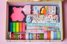 a box filled with lots of different types of washi tapes and other crafting supplies