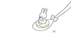 a drawing of a bunny on top of a cake with a spoon in its mouth