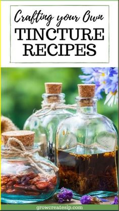 three glass jars filled with different types of tinctures on top of a table