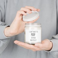 a person holding a jar with the words i can't wait to pop in your new toilet